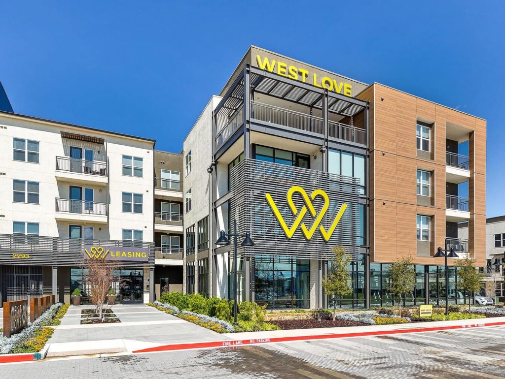 West Love community building with large decorative building signage