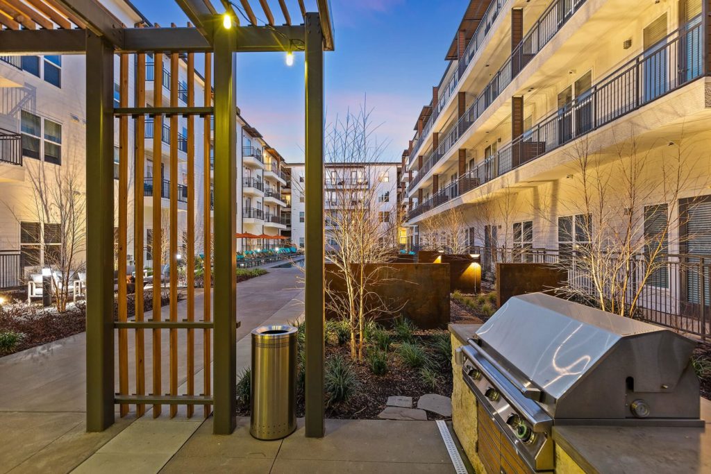 Outdoor courtyard covered area with community grill